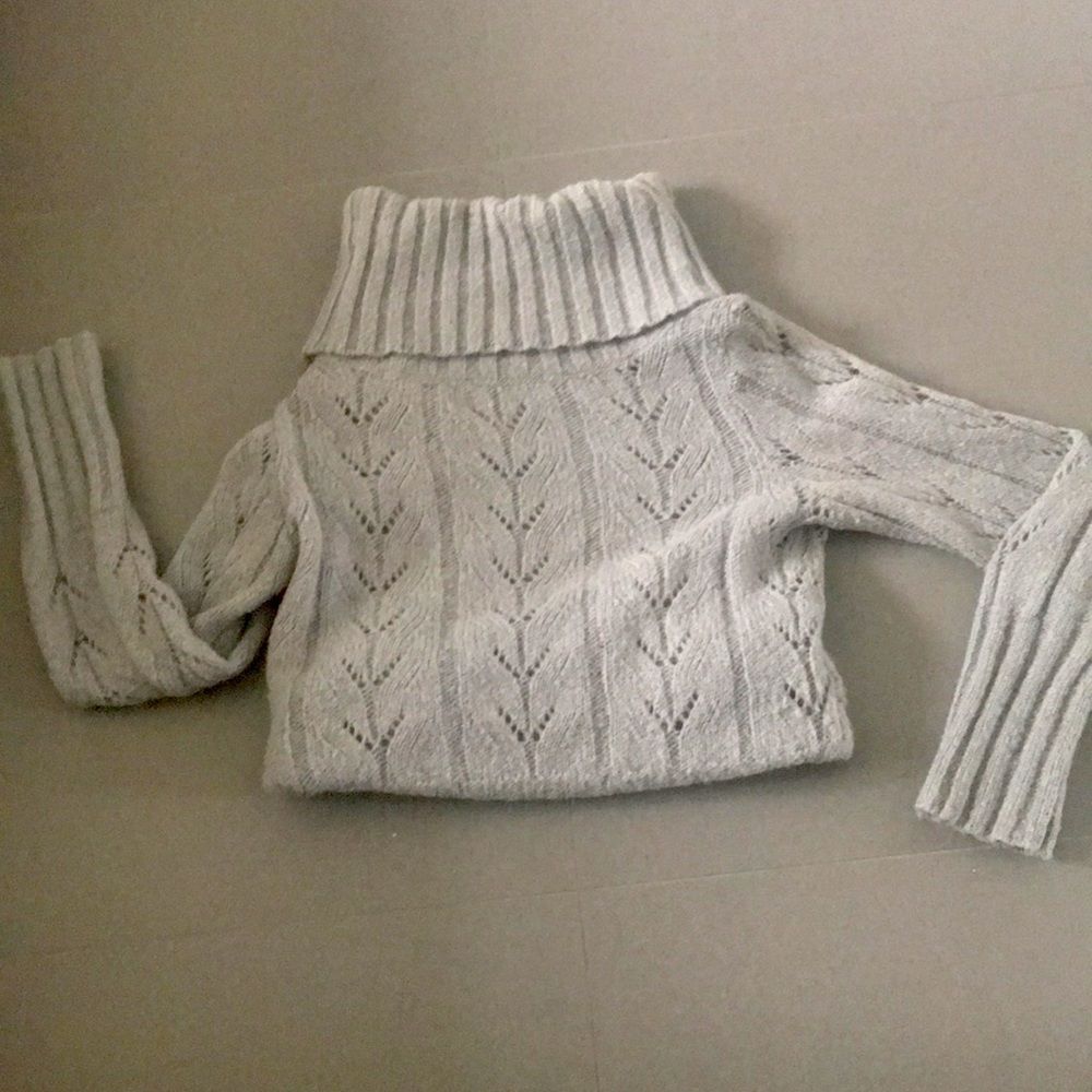 Grey knitted turtle neck